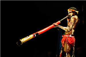 aboriginal playing didgeridoo